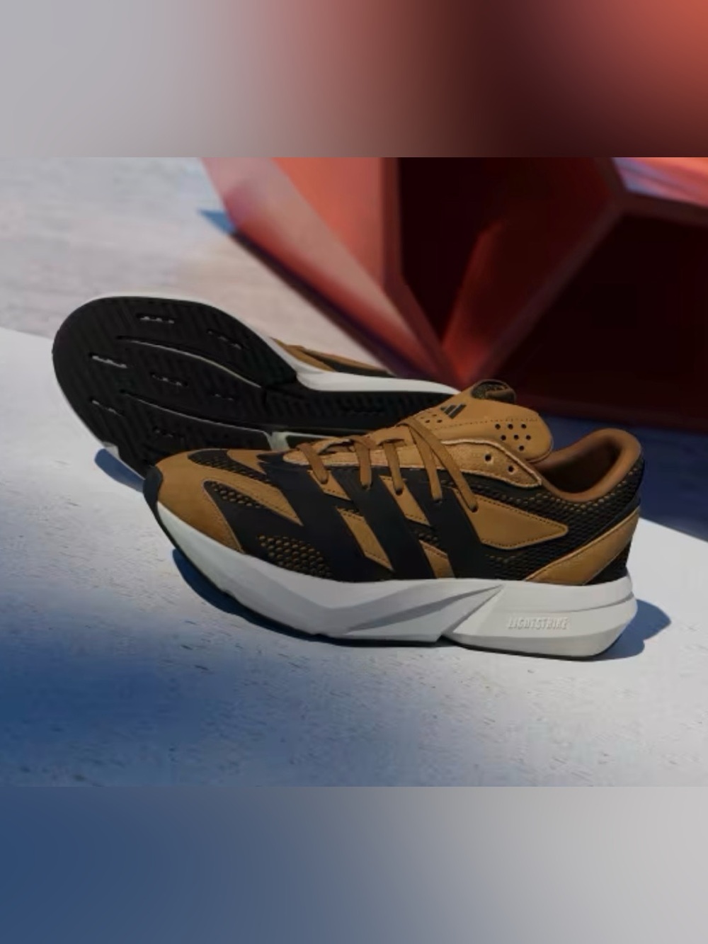 Adidas Lightblaze shoes in the Bronze Strata / Core Black / Off White
